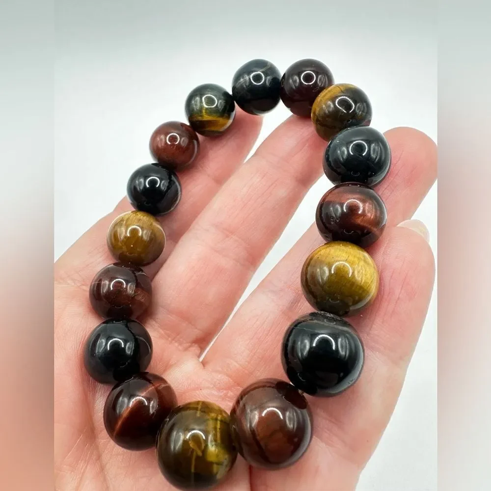 12mm red, black, blue, and yellow tigers eye stone stretchy bracelet!
